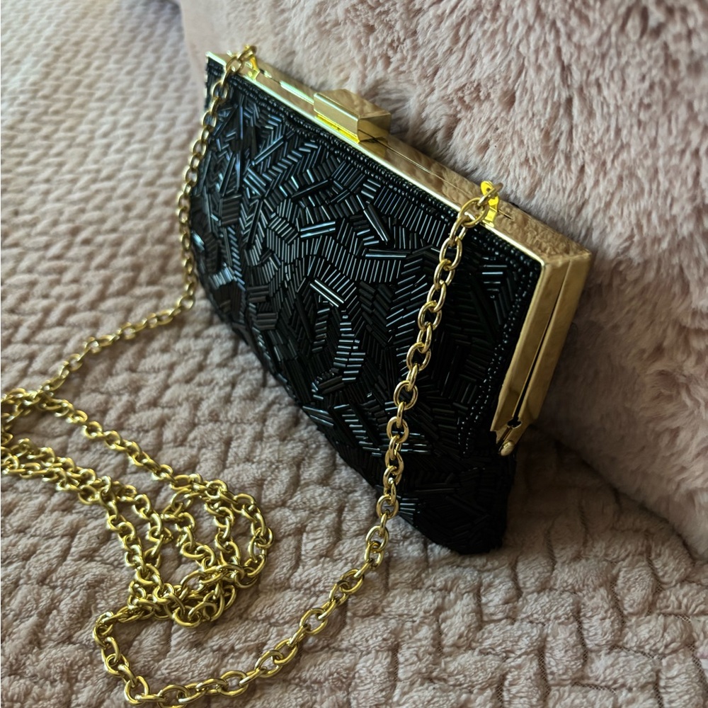 Elegant Black Clutch Bag with Gold Chain